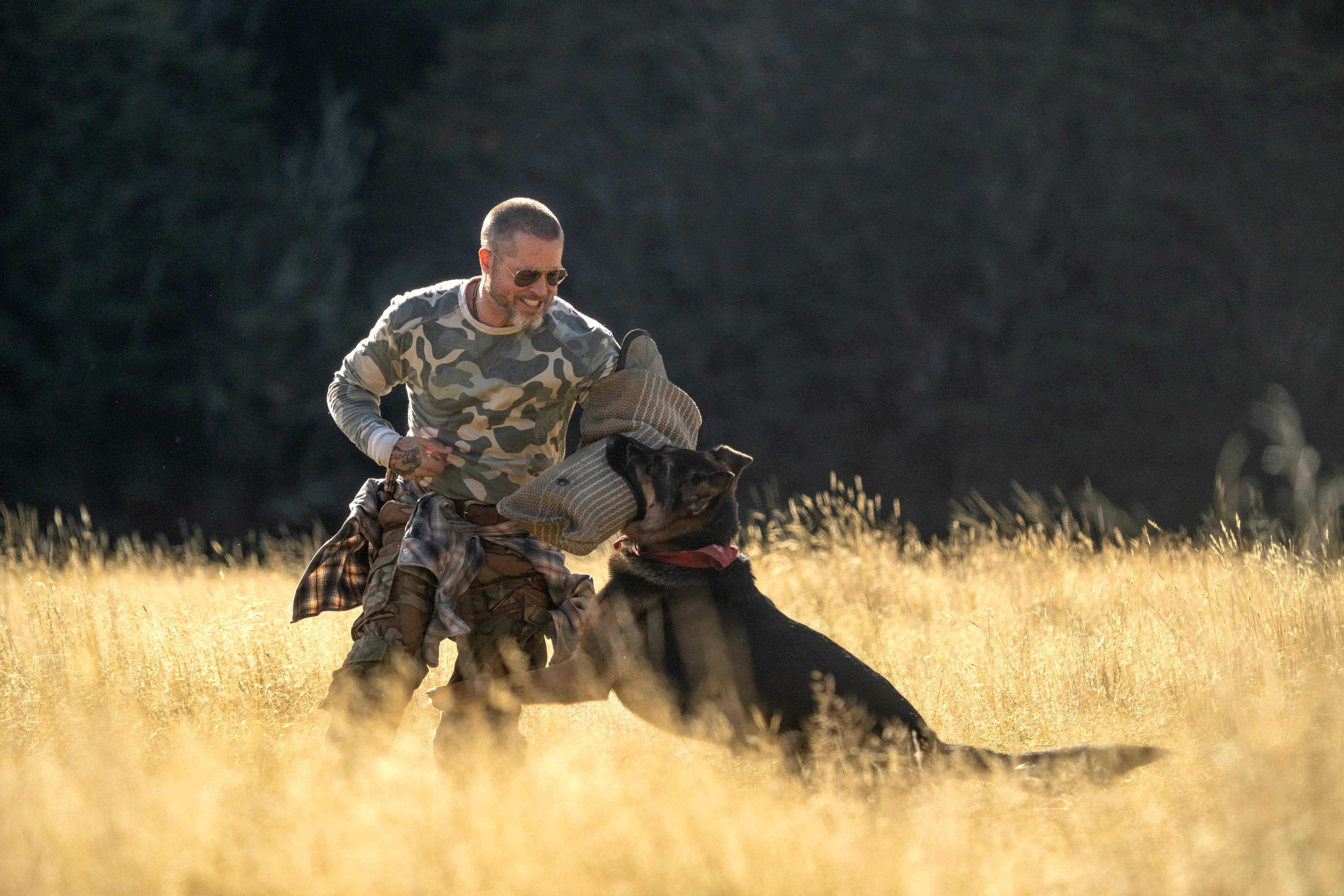 Brad Pitt as 'James Belmont' and Uber as 'Odin' in Heart of the Beast from Paramount Pictures.