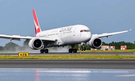 A Qantas 787 Dreamliner touching the ground on landing